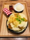 Grilled apples and cream brulee pancakes served with honey and vanilla ice cream.