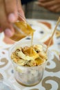 Thai grilled banana eating with coconut caramel sauce