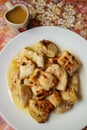 Grilled banana serve with syrup.