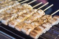 Grilled bananas on charcoal grill. Street food in thailand Royalty Free Stock Photo