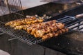 Grilled barbecue kebab street food meat outside charcoal heat flame