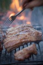 Grilled barbeque port. Cooking outdoor. Marinated grilled ribs. Summer picnic. Cooking dinner. Spareribs Ribs Close-up On The Hot Royalty Free Stock Photo