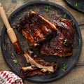 Grilled barbeque ribs with BBQ sauce and sides Royalty Free Stock Photo