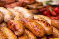 Grilled Bavarian sausages with vegetables on street food fastivale Royalty Free Stock Photo