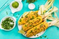 Grilled BBQ Corn on Cob, with Herbs, Butter,Pesto and Salt, Top View Royalty Free Stock Photo