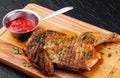 grilled bbq crispy chicken leg quarter on the wood board Royalty Free Stock Photo