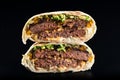 Grilled beef burgers in pita bread with cheese and arugula leaves Royalty Free Stock Photo