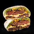Grilled beef burgers in pita bread with cheese and arugula leaves Royalty Free Stock Photo