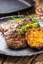 Grilled beef Rib Eye steak with garlic rosemary salt and spices Royalty Free Stock Photo