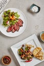 Roast Beef Salad with Green Mix and Bone Marrow with Vegetables