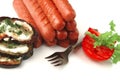 Grilled beef sausages on white Royalty Free Stock Photo