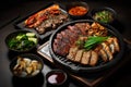 Grilled beef sliced on black plate with soy sauce, pickled radish, kimchi and dumplings Royalty Free Stock Photo