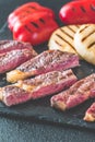 Grilled beef steak with bell peppers and cheese Royalty Free Stock Photo