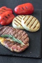 Grilled beef steak with bell peppers and cheese Royalty Free Stock Photo