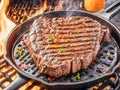 Grilled beef steak in a cast-iron