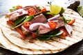 Grilled beef steak. Fajitos, tortillas with salsa, chili and beef on a dark background Royalty Free Stock Photo