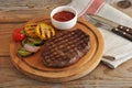 Grilled beef steak, grilled vegetables - zucchini, corn, onion, Royalty Free Stock Photo