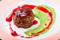 Grilled beef steak meat with berries and avocado sauce in plate. Hot Meat Dishes. Top view Royalty Free Stock Photo