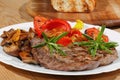 Grilled beef steak mushrooms, peppers, tomatoes Royalty Free Stock Photo