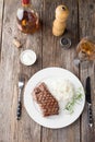 Grilled beef steak with rice and rosemary Royalty Free Stock Photo