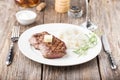Grilled beef steak with rice and rosemary