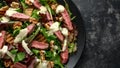 Grilled Beef Steak salad with pears, walnuts and greens vegetables and blue cheese sauce. healthy food. Royalty Free Stock Photo