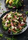 Grilled Beef Steak salad with pears, walnuts and greens vegetables and blue cheese sauce. healthy food. Royalty Free Stock Photo