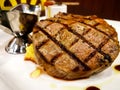 Grilled beef steak served with mashed potatoes and vegetables. Royalty Free Stock Photo