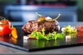 Grilled Beef steak with vegetable decoration. Grilled porterhouse steak on slate board. Royalty Free Stock Photo