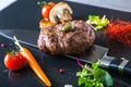 Grilled Beef steak with vegetable decoration. Grilled porterhouse steak on slate board. Royalty Free Stock Photo