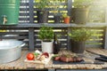 Grilled beef steak on wooden table top. Healthy food concept. Beef cut outdoors, garden kitchen, bbq grill patio Royalty Free Stock Photo