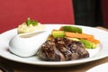 Grilled beef steaks with spices with vegetables, mashed potato, and mushroom sauce Royalty Free Stock Photo