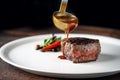 Grilled beef tenderloin steak on a white plate