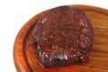 Grilled beef on wooden plate Royalty Free Stock Photo