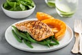 Grilled blackened salmon fillet with grilled squash Royalty Free Stock Photo