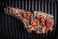 Grilled bone-in ribeye steak with chili