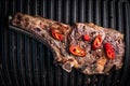 Grilled bone-in ribeye steak with chili