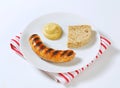 Grilled bratwurst with mustard Royalty Free Stock Photo