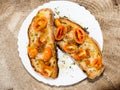 Grilled bread with Italian tomatoes, orange color, very long lasting, seasoned with olive oil and oregano