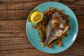 Grilled bream on a plate