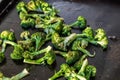 Grilled broccoli on a flat outdoor griddle