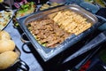 Grilled buffet. Chicken and meat sticks in a silver bowl Royalty Free Stock Photo