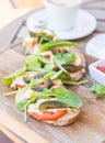 Grilled camambert and green figs with rocket and tomato on sour Royalty Free Stock Photo