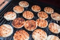 Grilled cheese arepas, made with cornmeal and cheese. Popular dish from Colombia Royalty Free Stock Photo