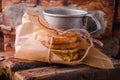 Grilled cheese sandwich on paper with coffee cup on wooden board. Selective focus. Royalty Free Stock Photo