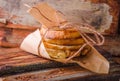 Grilled cheese sandwich on paper on wooden board. Selective focus. Royalty Free Stock Photo