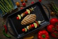 Grilled chicken breast with brochette vegetable