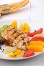 Grilled chicken breast and citrus salad Royalty Free Stock Photo