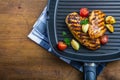 Grilled chicken breast in different variations with cherry tomat