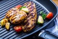 Grilled chicken breast in different variations with cherry tomat